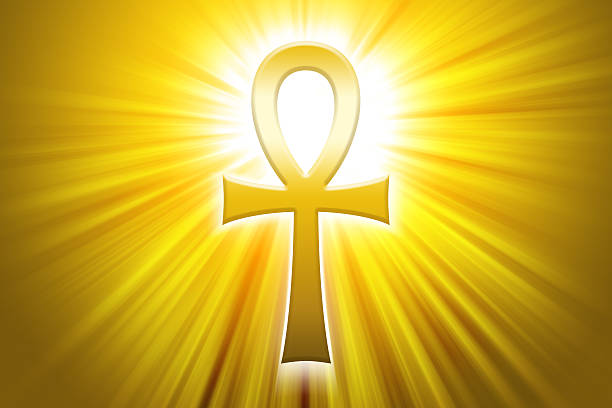 Golden Ankh with sunbeams. Also breath of life, the key of the Nile or crux ansata, cross with a handle. Ancient Egyptian symbol, sign and hieroglyph of gods and Pharaohs representing concept of life.